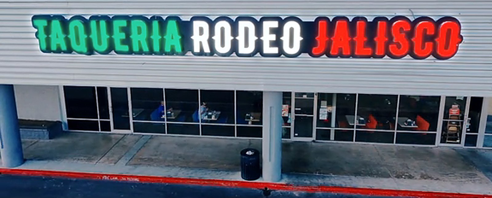 The Taqueria Rodeo Jalisco sign above the restaurant's front windows on Colony Dr